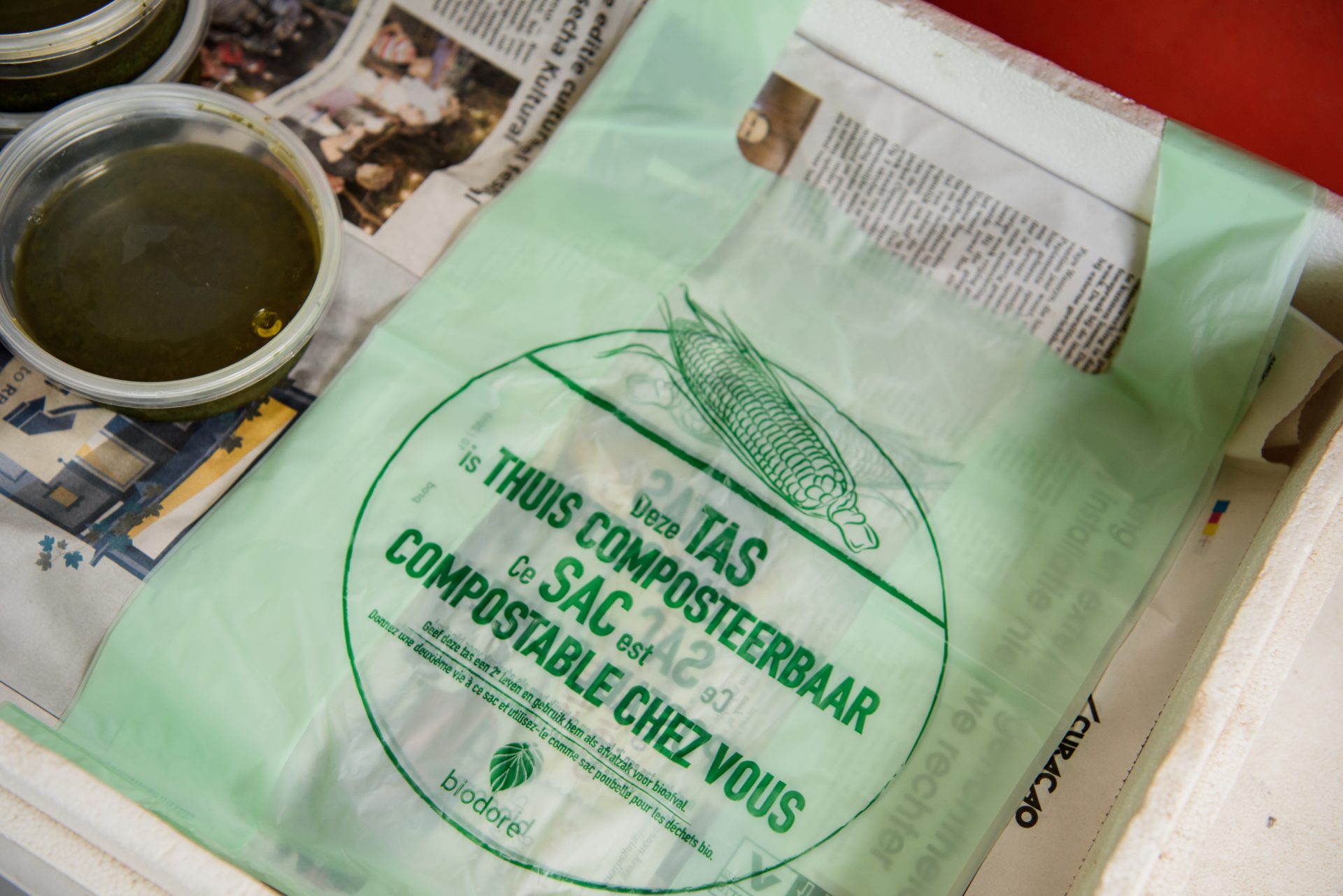Plastic bag with a newspaper on the background